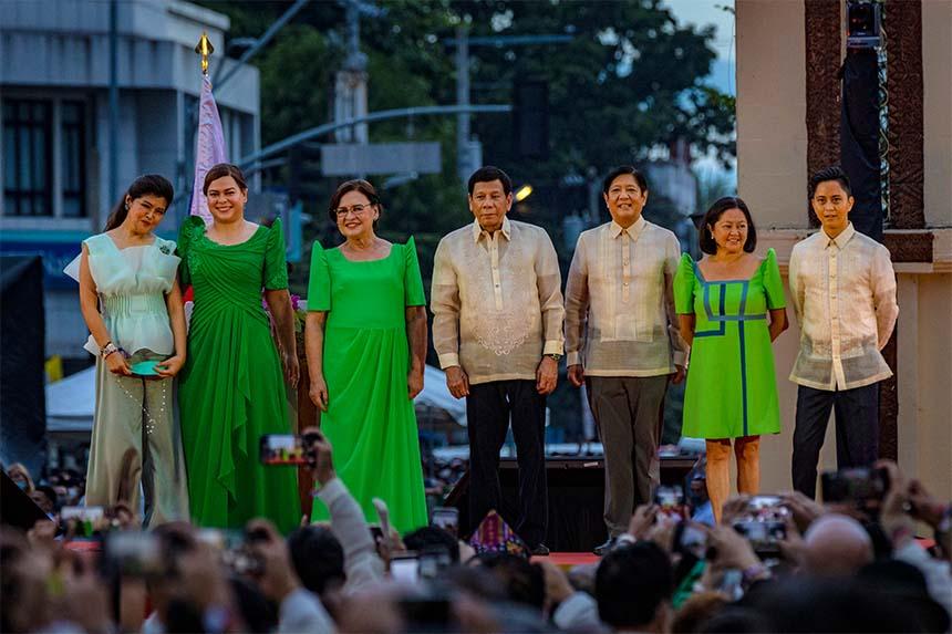 The Duterte and Marcos families pose for pictures during the oathtaking of Sara Duterte as the next vice president on 19 June 2022 in Davao, Philippines.