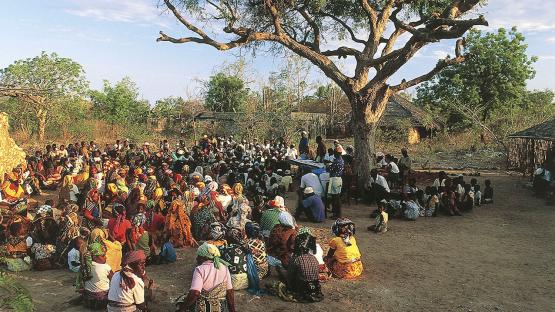 Photo of people at a rally in a village on Ibo Island, Mozambique.