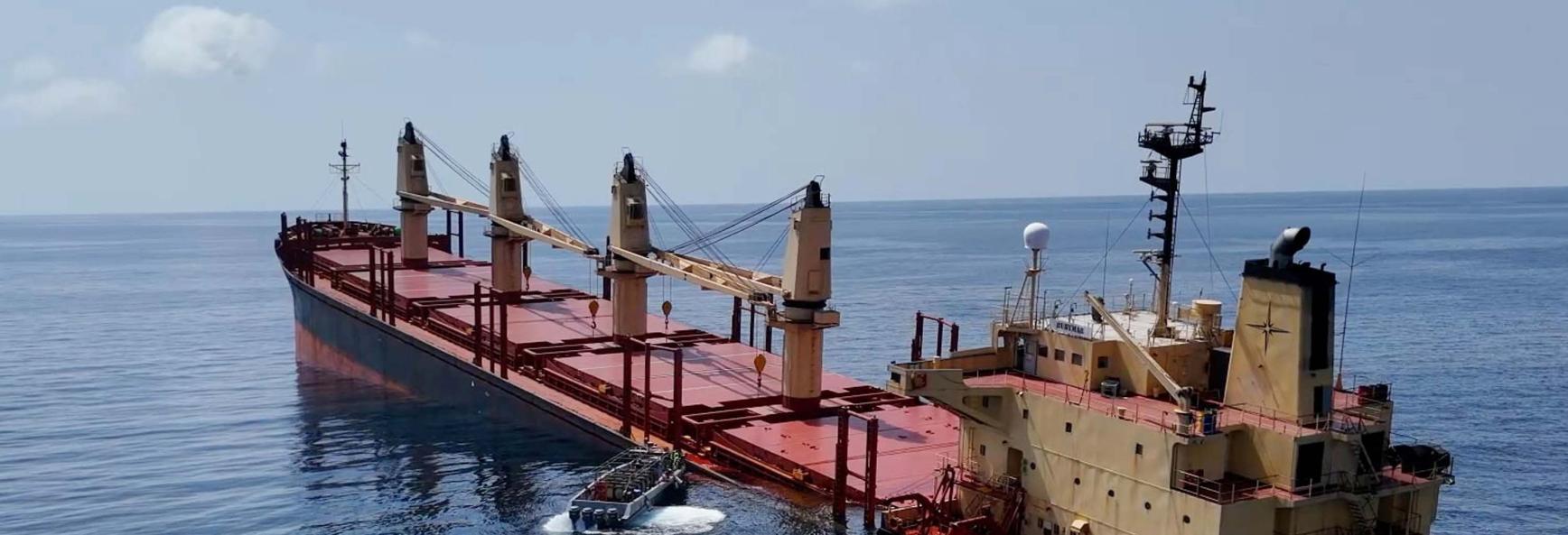 This handout photo provided by Yemeni Al-Joumhouria TV, shows the British-registered cargo ship 'Rubymar' sinking, after it was targeted by Yemen's Houthi forces in international waters in the Red Sea, on March 3, 2024, in the Red Sea. 