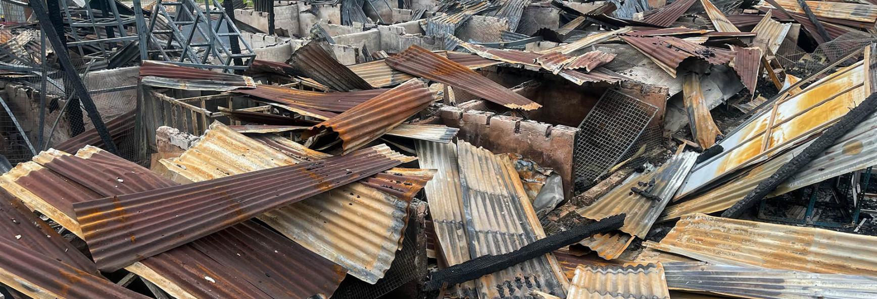 This photo taken on 10 August 2024 shows a burnt-out building in Lashio in Myanmar's northern Shan State, following fighting between Myanmar's military and Myanmar National Democratic Alliance Army (MNDAA) in the region.