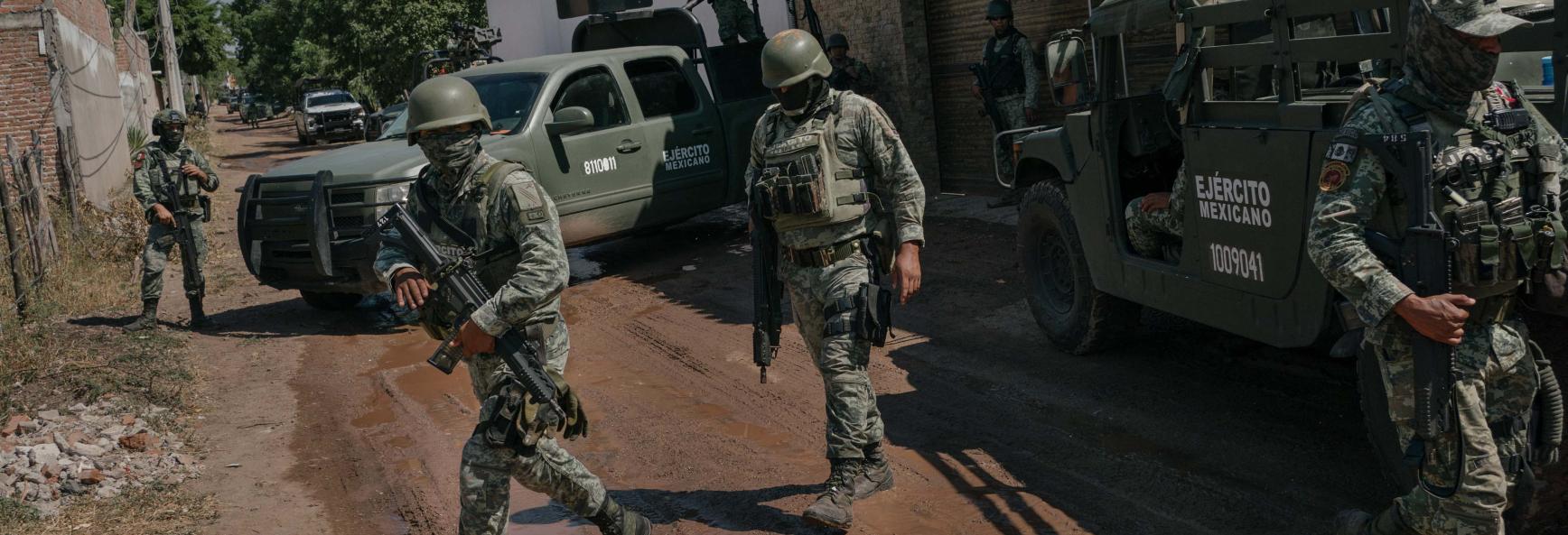 CULIACAN, SINALOA, MEXICO, October 22, 2024: Members of the military arrive at a scene where a key mid-level operator for Ismael "El Mayo" Zambada was captured following a fierce battle between the military and civilians, leaving 19 civilians dead. 