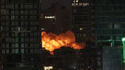 Smoke and flame rise after Iranian strikes hit a building as Iran's ongoing retaliatory attacks with ballistic missiles towards Israel are seen from Tel Aviv on 16 June 2025.